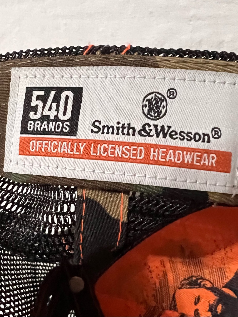 Men's Camo Trucker Hat in Green with Orange Stitching - Picture 4 of 4